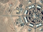 A satellite image shows military activity underway at the Xinjiang octagon-shaped installation, with large tents and a range of military vehicles, in the Xinjiang Uyghur Autonomous Region, China.