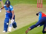 England's Amy Jones attempts to run out India's Harmanpreet Kaur during the second T20I in Bristol on Saturday. (AP)