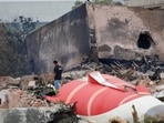 A fire offical stands next to the crashed Air India Boeing 787-8 Dreamliner aircraft, in Ahmedabad, India, June 13, 2025. (REUTERS)