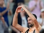 Novak Djokovic gestures to the crowd after a thrilling loss to Joao Fonseca. 