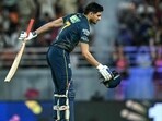 Shubman Gill celebrates after scoring a century against the Rajasthan Royals.