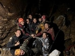 Rescuers pose for a photo as they work to save trapped people in a cave in Xaisomboun Province, Laos, May 29, 2026.