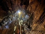 The first of the trapped group was safely evacuated on Friday. 