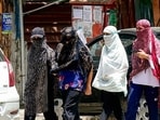 Nagpur, May 29 (ANI): Women cover themselves with scarves to beat the scorching heat, in Nagpur on Friday. (ANI Photo) (Chandrakant Paddhane)
