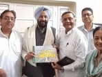 Newly appointed Punjab BJP president Kewal Singh Dhillon calling on senior party leader Manoranjan Kalia at his residence in Jalandhar on Saturday. (HT Photo)