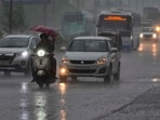 People make their way amid showers in Ludhiana on Saturday; and (right) residents wade through a waterlogged street on Rahon Road. (Gurpreet Singh/HT) People make their way amid showers in Ludhiana on Saturday; and (right) residents wade through a waterlogged street on Rahon Road. (Gurpreet Singh/HT)