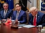 US Interior Secretary Doug Burgum, Secretary of State Marco Rubio and US President Donald Trump attend a cabinet meeting in the Cabinet Room at the White House, in Washington.