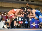 Vinesh Phogat (R) during the selection trials of Asian Games at IGI Stadium in New Delhi on Saturday. (Sanchit Khanna/Hindustan Times)