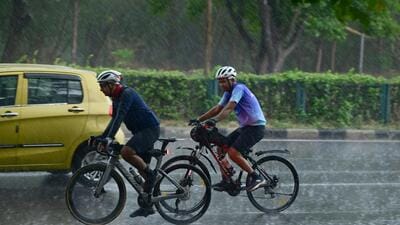 Cycling enthusiasts enjoying the rain in Chandigarh on Saturday morning. The weather took a turn for a pleasant after over 10 days of scorching heat. (Ravi Kumar/HT) Cycling enthusiasts enjoying the rain in Chandigarh on Saturday morning. The weather took a turn for a pleasant after over 10 days of scorching heat. (Ravi Kumar/HT)