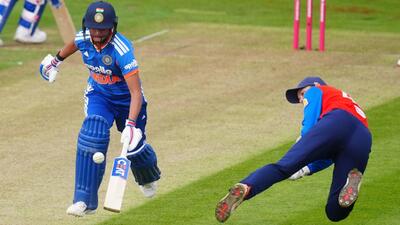 England's Amy Jones attempts to run out India's Harmanpreet Kaur during the second T20I in Bristol on Saturday. (AP) England's Amy Jones attempts to run out India's Harmanpreet Kaur during the second T20I in Bristol on Saturday. (AP)