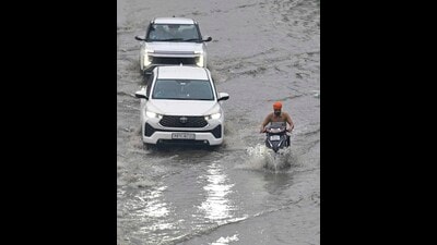 Residents said water remained accumulated at several locations long after the rain had stopped, indicating shortcomings in the city’s drainage system. (Gurpreet Singh/HT) Residents said water remained accumulated at several locations long after the rain had stopped, indicating shortcomings in the city’s drainage system. (Gurpreet Singh/HT)