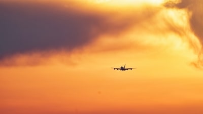 An airplane flies towards Munich Airport at dusk, in Munich, Germany on March 2, 2026 (AP/File)