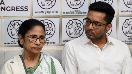 AITC chairperson Mamata Banerjee along with AITC general secretary Abhishek Banerjee during a press conference. (Hindustan Times)