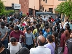 Students arrive at an examination centre to appear for the Common University Entrance Test (CUET-UG) 2026 at Sarita Vihar, in New Delhi on Saturday. 