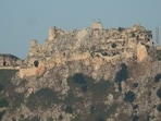 An Israeli flag and a flag of the Golani Brigade are raised on Beaufort Castle, as seen from Marjayoun, southern Lebanon.