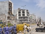 New Delhi: Security personnel during a demolition drive to remove encroachments along a road, in Shalimar Bagh area. (PTI)