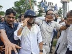 TMC General Secretary Abhishek Banerjee wears a helmet after stones and eggs were hurled at him during his visit to meet families of post-poll violence victims, in Sonarpur, West Bengal.