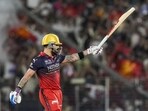 Royal Challengers Bengaluru's Virat Kohli celebrates his half century in Ahmedabad on Sunday. (PTI)