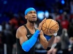 Oklahoma City Thunder guard Shai Gilgeous-Alexander warms up prior to Game 7 of the Western Conference finals of the NBA basketball playoffs series against the San Antonio Spurs, Saturday, May 30, 2026, in Oklahoma City. (AP Photo/Tony Gutierrez)