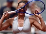 Ukraine's Marta Kostyuk reacts during her fourth round match against Poland's Iga Swiatek. (REUTERS)