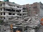 Two engineers have been suspended by the MCD in connection with the collapse of a four-storey commercial building near Saket metro station in Delhi on Saturday (May 30) evening Two engineers have been suspended by the MCD in connection with the collapse of a four-storey commercial building near Saket metro station in Delhi on Saturday (May 30) evening