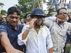 TMC General Secretary Abhishek Banerjee wears a helmet after stones and eggs were hurled at him during his visit to meet families of post-poll violence victims, in Sonarpur, West Bengal.