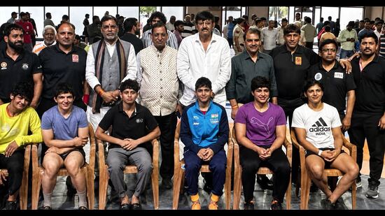 Mansi (4th from left) with Antim Panghal (5th from left) with other four women wrestlers selected for Asian Games. (HT Photo)