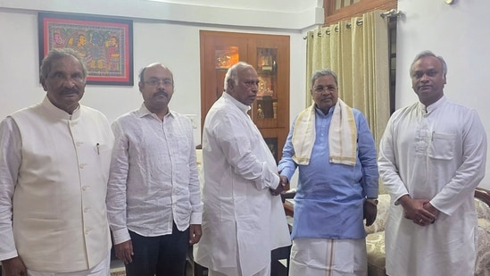 In this image received on May 29, 2026, Congress President and Rajya Sabha LoP Mallikarjun Kharge with party leader Siddaramaiah during a meeting after the latter stepped down from the post of Karnataka Chief Minister, in New Delhi. Karnataka Ministers KJ George and Priyank Kharge and state MLA Yathindra Siddaramaiah are also present. (PTI)