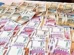 (Representative image) The accused from Aligarh was allegedly printing and distributing counterfeit currency, with a third associate still absconding. (PTI)