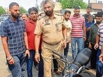 Police at the spot on Shingar Cinema Road in Ludhiana on Monday. (Gurpreet Singh/HT) Police at the spot on Shingar Cinema Road in Ludhiana on Monday. (Gurpreet Singh/HT)