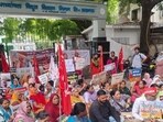 Protesters outside the MVVNL headquarters in Lucknow on Monday. (HT)