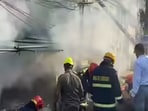 The fire first engulfed the fish market on the ground floor and spread to the upper floors. (ANI)