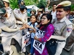 Police detain the members of the All India Students' Association (AISA) and Krantikari Yuva Sangathan (KYS) as they protest against the NEET paper leak and CUET postponement 