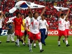 South Korea players celebrate after their win against Spain in the 2002 FIFA World Cup