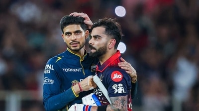 RCB's Virat Kohli with GT skipper Shubman Gill after hitting the winning runs. (ANI Pic Service)