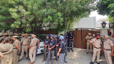 Police personnel outside the residence of SAD leader Bikram Singh Majithia in the Green Avenue locality of Amritsar during a raid. (Sameer Sehgal/HT) Police personnel outside the residence of SAD leader Bikram Singh Majithia in the Green Avenue locality of Amritsar during a raid. (Sameer Sehgal/HT)