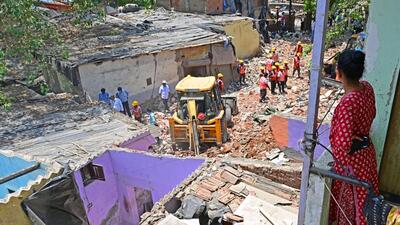 iMumbai, India - May 31, 2026: The Municipal Corporation's T Ward Encroachment Removal Squad demolished 150 unauthorized residential and commercial structures at Amar Nagar and Khindipada on Sunday, clearing obstacles in the construction of the Goregaon–Mulund Link Road in Mumbai, India, on Sunday, May 31, 2026. (Photo by Satish Bate/ Hindustan Times) (Hindustan Times) iMumbai, India - May 31, 2026: The Municipal Corporation's T Ward Encroachment Removal Squad demolished 150 unauthorized residential and commercial structures at Amar Nagar and Khindipada on Sunday, clearing obstacles in the construction of the Goregaon–Mulund Link Road in Mumbai, India, on Sunday, May 31, 2026. (Photo by Satish Bate/ Hindustan Times) (Hindustan Times)