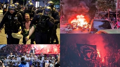 In the riots amid the celebrations in Paris, cars and rental bikes' stands were reportedly set on fire, shops were looted, and some storefronts were destroyed. (AP/X) In the riots amid the celebrations in Paris, cars and rental bikes' stands were reportedly set on fire, shops were looted, and some storefronts were destroyed. (AP/X)