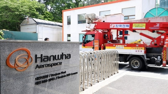 A vehicle of Korea Electric Power Corporation enters the main gate at the Hanwha Aerospace plant in Daejeon on June 1, 2026, after a reported explosion. (AFP)