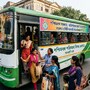 সরকারি বাসে মহিলাদের বিনামূল্যে যাতায়াত চালু হল। (ছবিটি প্রতীকী, সৌজন্যে Nano Banana দিয়ে তৈরি করা)