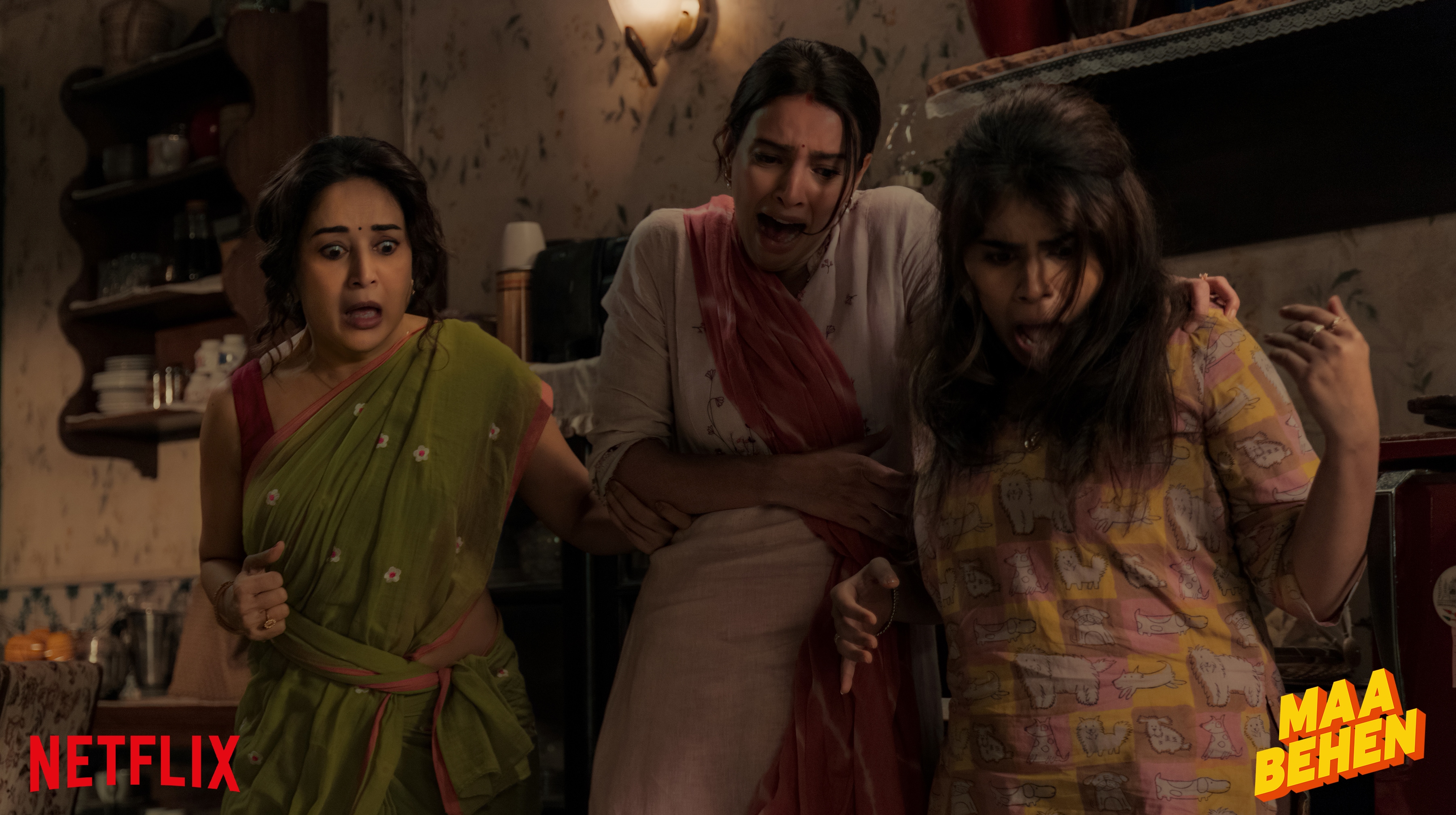 Madhuri Dixit with her on-screen daughters Triptii Dimri and Dharna Durga in Maa Behen. Madhuri Dixit with her on-screen daughters Triptii Dimri and Dharna Durga in Maa Behen.