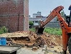 A building being demolished during the drive in Ludhiana on Tuesday. (HT Photo) A building being demolished during the drive in Ludhiana on Tuesday. (HT Photo)