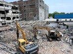 NDRF team conducts rescue operations at the site on the third day of a building collapse in Saidulajab, in New Delhi.