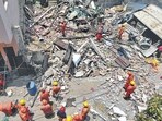 It took locals and officials around two hours to search for and rescue the victims who were trapped under the debris. (Ishant Chauhan/Hindustan Times) It took locals and officials around two hours to search for and rescue the victims who were trapped under the debris. (Ishant Chauhan/Hindustan Times)