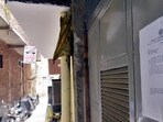 Officials pasted a 15-day notice outside the house, stating that the structure had been built on government land and directing the occupants to vacate the premises. (Sakib Ali/HT Photo)
