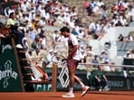 Paraguay's Adolfo Daniel Vallejo reacts as he plays against France's Moise Kouame during their men's singles match on day 5 of the French Open 