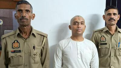 Abhishek Mishra aka Aadikarta Narain Dass in Mathura police custody. (HT Photo)