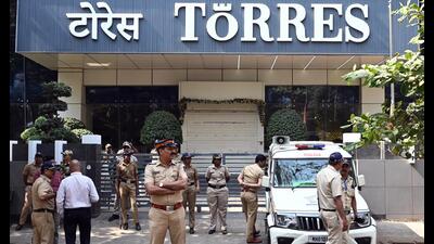 Mumbai, India. Jan 07, 2025: Heavy police security outside Torres's office in Dadar. Investors gathered in large numbers outside the office of Torres Jewellers in Dadar, Mumbai, demanding the return of their principal amounts after the company failed to pay the promised returns on its investment schemes. The Mumbai police booked the company's directors for committing multi-million fraud. Mumbai, India. Jan 05, 2025. (Photo by Raju Shinde/HT Photo) (Hindustan Times) Mumbai, India. Jan 07, 2025: Heavy police security outside Torres's office in Dadar. Investors gathered in large numbers outside the office of Torres Jewellers in Dadar, Mumbai, demanding the return of their principal amounts after the company failed to pay the promised returns on its investment schemes. The Mumbai police booked the company's directors for committing multi-million fraud. Mumbai, India. Jan 05, 2025. (Photo by Raju Shinde/HT Photo) (Hindustan Times)