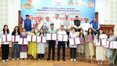 Chief Minister Pushkar Singh Dhami distributes appointment letters to newly selected candidates at the Chief Minister's Camp Office in Dehradun on Monday. Chief Minister Pushkar Singh Dhami distributes appointment letters to newly selected candidates at the Chief Minister's Camp Office in Dehradun on Monday.