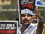 A person protests in New Delhi against the CBSE over discrepancies in the on-screen marking system. (PTI)